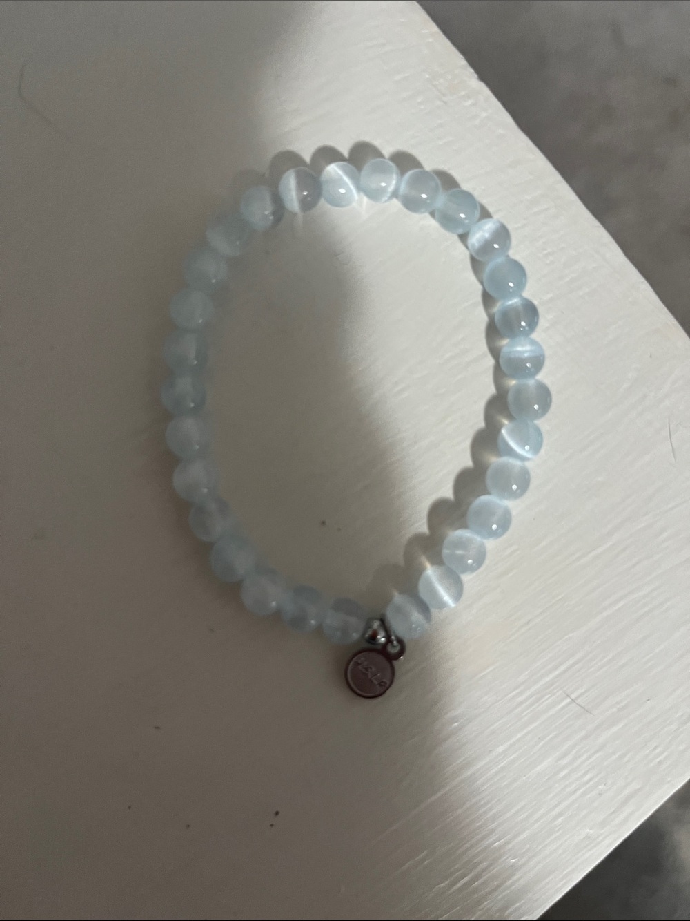 Soft Sky Blue Beaded Stretch Bracelet with Silver Charm